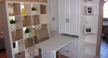 hidden murphy bed unit paired with a desk