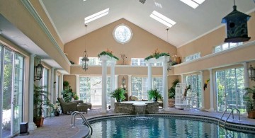 homes with indoor pools with pendant lamps