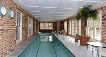 indoor lap pool with brick walls