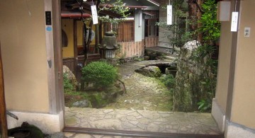 japanese garden designer with paper lamps