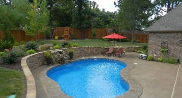 kidney shape pool in small yard