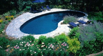 kidney shape pool with stone deck