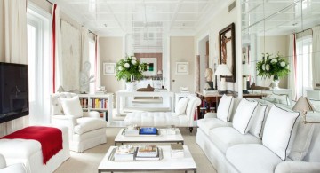 long living room in white with glass wall