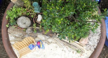 mini japanese garden with white sand