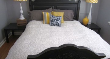 minimalist yellow gray bedroom with black bed frame