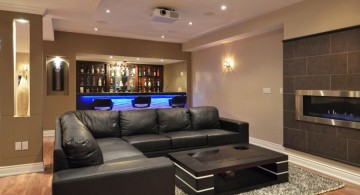 modern basement with sleek black sofa