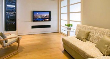 modern built-in TV design in a cozy minimalist living room with beige color scheme