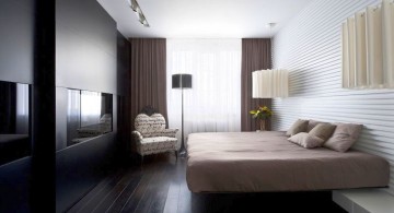 modern floating bed with wall panel as headboard