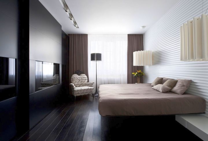 modern floating bed with wall panel as headboard