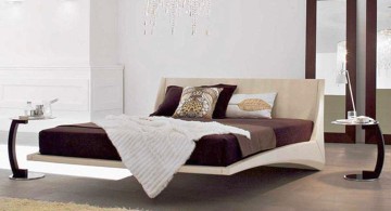 modern floating bed with white frame and chocolate bedding