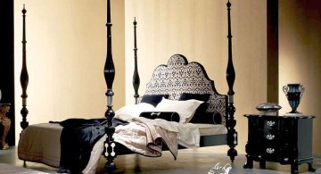 modern four poster bed with spindles in black