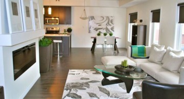 modern long living room design featuring floral patterned rug