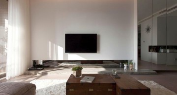 modern minimalist living room with mirror wall panel