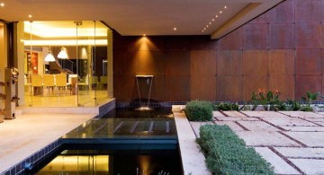 modern water features with stone pathway
