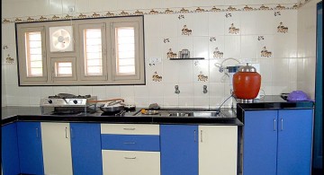 modular kitchen in blue and white with patterned tile