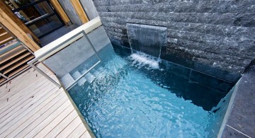 pool for small yard with wall waterfall and glass door