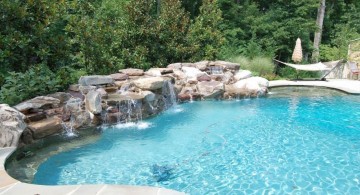 pool waterfall ideas with river stone