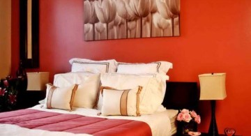 red bedroom walls with flower painting