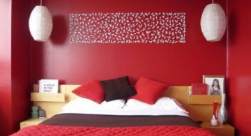 red bedroom walls with wall decor