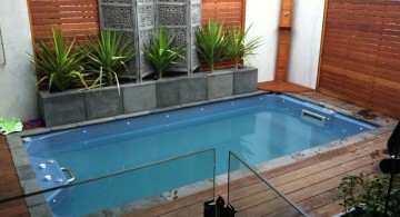 simple small pool ideas with tall wooden walls