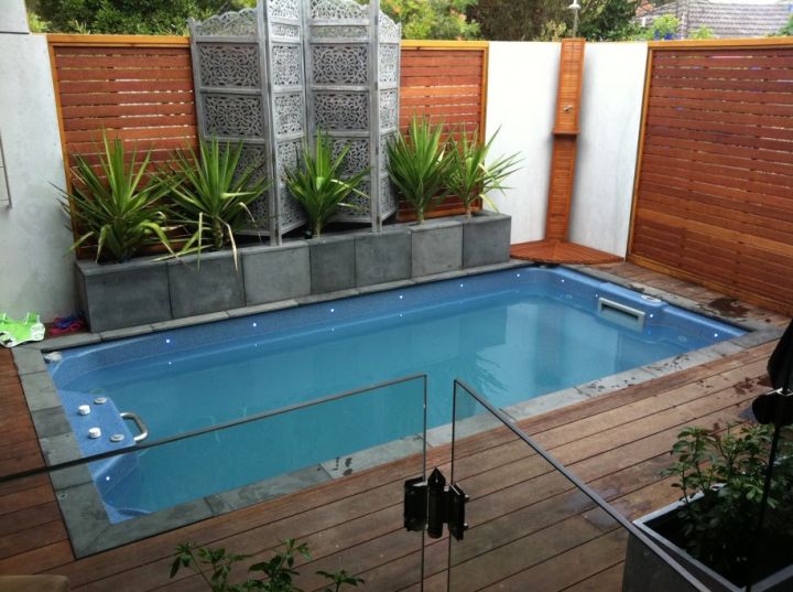 simple small pool ideas with tall wooden walls