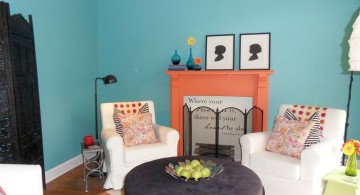 simple turquoise living room decor with fireplace