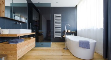 wood bathroom with black tile wall