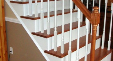 wood staircase with white balusters