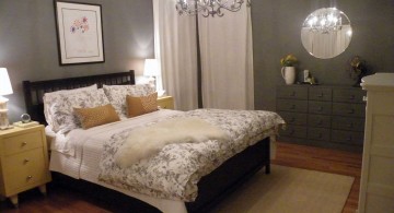 yellow gray bedroom with chandelier