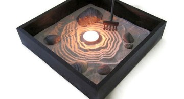 zen style mini japanese garden with candle