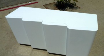 contemporary waved white lacquer credenza