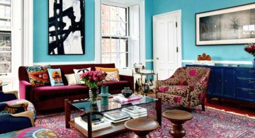 eclectic rooms with blue wall and flower sofa