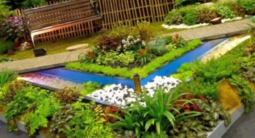 featured of terraced flower garden with small pond and garden chair