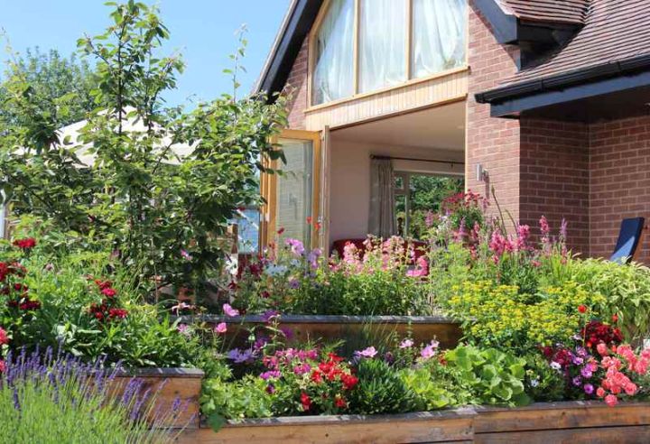 front yard terraced flower garden