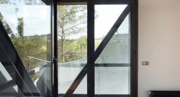 modern glass door with dark wood