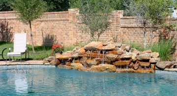 natural red stone pool waterfall ideas