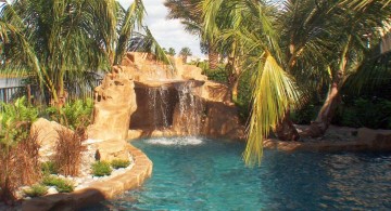 pool waterfall ideas with tall trees