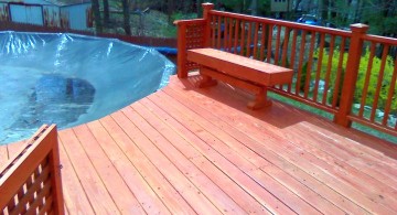 simple wood pool deck with sitting area