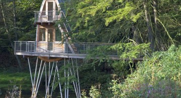 treehouse on stilts above the river