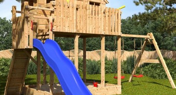 treehouse on stilts with slide and swing