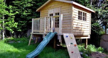 treehouse on stilts with slides