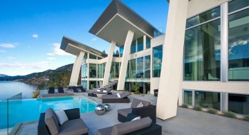 ultramodern lake house front facade and pool