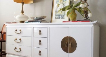 white lacquer credenza with chinese coin accent