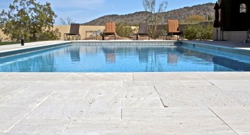 brick paved pool deck stone