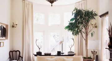 cathedral ceiling living room with unique pendant lamp