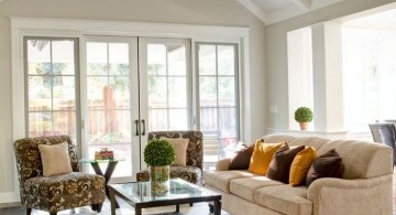 cathedral ceiling living room with white ceiling fan