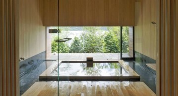 minimalist Japanese bathroom designs with floor tub