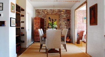 mounted bookshelves in dining room for small space