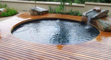 round swimming pools for small spaces with wooden deck