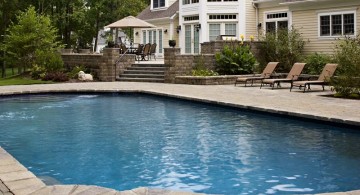 simple grey paved pool deck stone